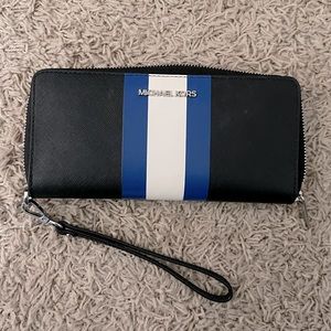 Michael Kors wallet/wristlet black with royal blue and white stripe